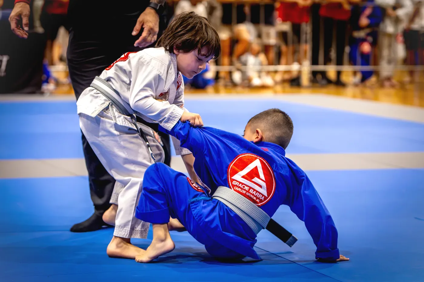Kids training Brazilian Jiu-Jitsu together at Gracie Barra